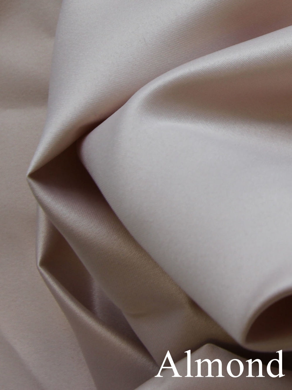 sample of almond silk satin fabric