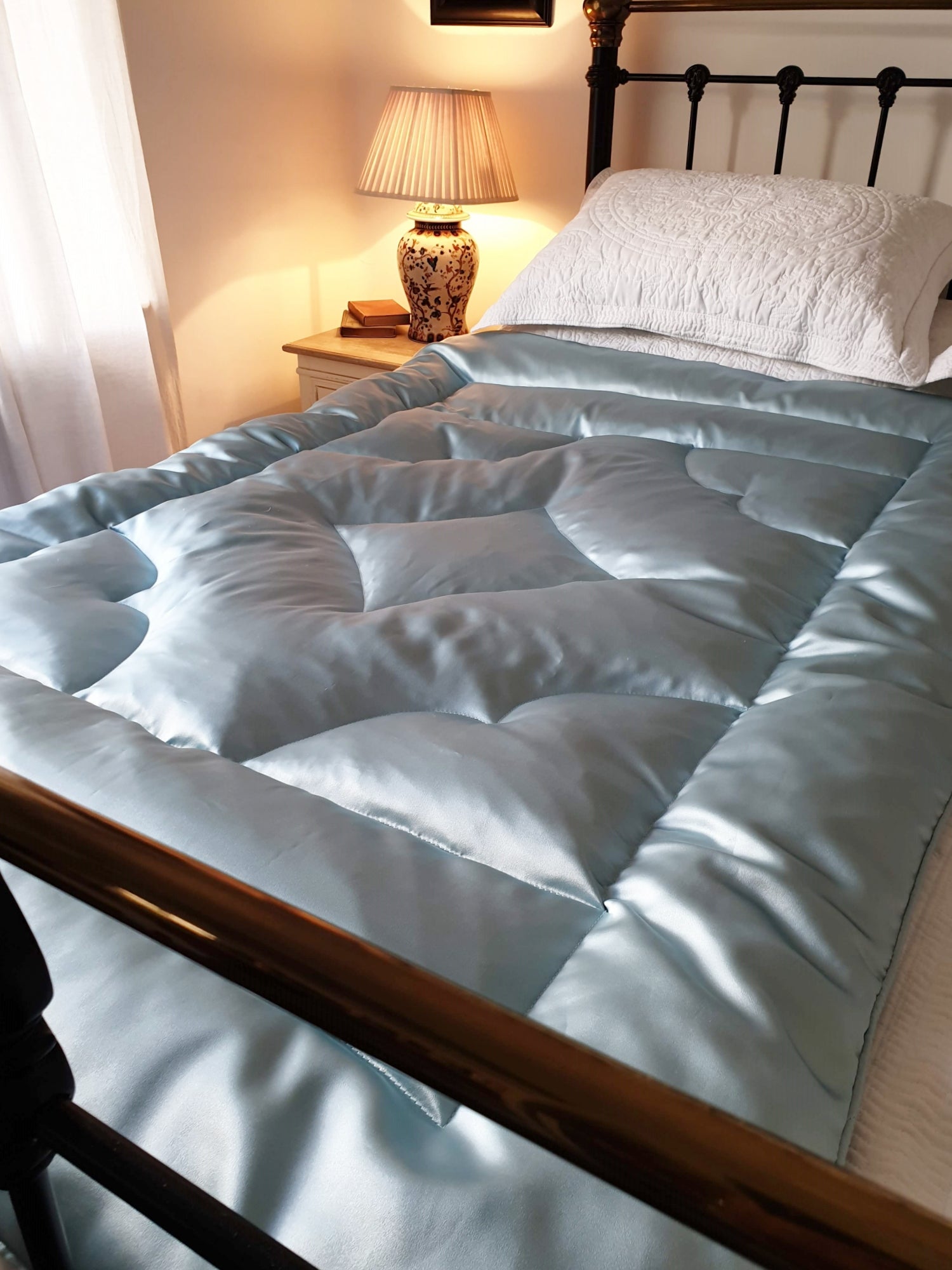 Aqua Blue 100% Silk Satin Eiderdown on bed